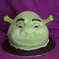 Sculpted Shrek Cake Sculpted Cake Shrek done in class at BGC. Vanilla Cake, Swiss Meringue Buttercream and Modelling Chocolate. I painted his eyes, eyebrows