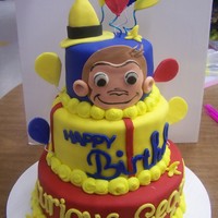 Curious George Curious George done for a 1st Birthday. Fondant covered and fondant decorations, TFL!