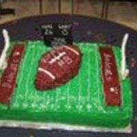 Football Birthday Cake This was made for a boy's birthday that played football. The sheet cake was half white and half chocolate. The accents are buttercream...