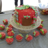 Strawberry Shortcake This is actually the first time I ever used fondant. The cake itself is covered in strawberry icing, but the decorations are fondant. Minus...