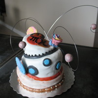 Mk's 13Th My very first attempt at a topsy turvy cake....oh and a fondant cake period