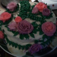 Roses chocolate cake with buttercream icing and buttercream roses just playing around try to make roses