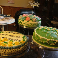 40Th Birthday Cake The top cake is covered in butter cream roses.