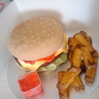 Burger And Fries My first attempt at a food cake, think it turned out quite well, added a little pot of butter cream to dip the fries in.