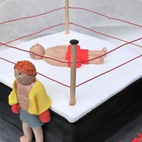 Boxing Time This was a cake I made for a kickboxer for his birthday. All parts of the cake were hand-made by me and are all edible. Yum!