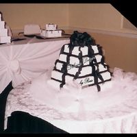 Tower Of Gifts This was for a formal graduation party...Black & White was the color scheme...The guest of honor wanted the cake to look like the...
