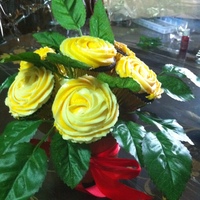 Yellow Cupcake Roses Bouquet For My Mom. Just Coz It's Monday! my first attempt at a cupcake bouquet. chocolate cupcakes with yellow buttercream roses.