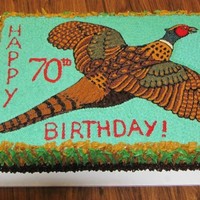 Pheasant Cake My father is a dog trainer and avid pheasant hunter. I spent hours on the feathers on this pheasant, just to make it just right for his...