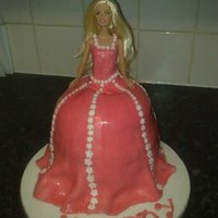 Barbie barbie dress cake with reusuable barbie doll - maderia with buttercream and fondant icing
