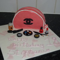 "chanel" Make Up Bag plain maderia with jam and buttercream filling with sugarpaste "make up"