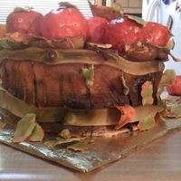 Apple Barrel Cake My first Apple Cake Barrel cake! Apples are RCK covered in fondant. Used alot of airbrush . Not perfect but happy with the reluslts~
