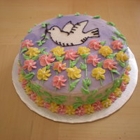 Kev's First Communion Buttercream frosting, decorations with a vanilla rum cake