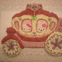 Hello Kitty Princess Carrriage Butter cream, fondant hello kitty. Made with Wilton mold