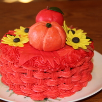 Fall Basket 6" Chocolate cake with cherry pie filling and cherry buttercream. Apple and pumpkin are modeling chocolate. Flowers and leaves are...