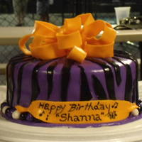 Shanna's Zebra This is my first fondant cake. the bow is fondant but honestly I didn't think it gt as hard as i would have liked. It may have had to...