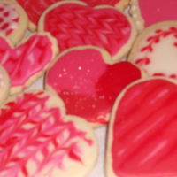 Valentine Cookies Fun heart shaped VDay cookies using No Fail Sugar Cookie recipe. Huge hit with everyone. Had a fun day decorating these with my daughter.