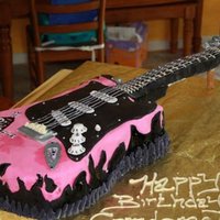 Avril Lavigne Fender Guitar Cake Real size guitar cake with hand painted Avril Lavigne logo. Completely edible other than structure.
