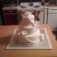 Calla Lily Wedding Cake First wedding cake and first time making gumpaste flowers and drapes. WASC cake with buttercream frosting and MMF