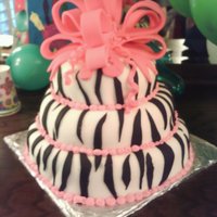 Zebra Cake With Pink Fondant Bow. My first fondant cake, for my neice Isabella's birthday.