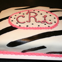 Zebra Stripe Cake With Pink This was a cake for a young girl. She chose what she wanted and was quite specific. I used fondant and then did the pink trim in...