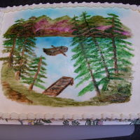 Painted Cake This is a cake I made for my father in law. It is retired and enjoys fishing and camping.It is a buttercream cake and I painted the scene...