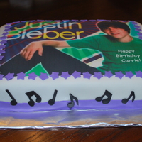 Justin Bieber Birthday Cake Half chocolate and half white cakes with buttercream and covered in MMF.
