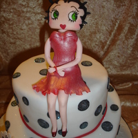 Betty Boop My first topsy turvy cake, and my first attempt of making Betty Boop in gumpaste.