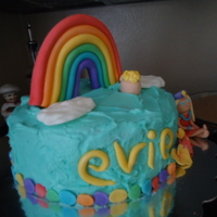 Rainbow Cake This cake was my favorite and best so far I think!!!! The rainbow and figure are fondant including the border, the gold pot is gum paste,...