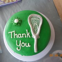 Thank You To A Lacrosse Coach Green is MMF and the lacrosse stick is buttercream fondant.