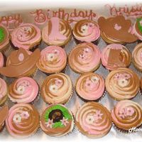 Cowgirl ordered for a girl who loves her cowgirl boots, hat, and her sister jokes to her about cowpies, so she had me make some fondant ones to put...