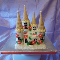 My First Fairy Castle Cake This won't be my last fairy castle cake, I loved doing it. This was not exactly how I would have done it, but I was following a photo...