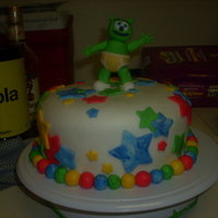 First Fondant Cake my first time working with fondant, and doing figurines. i really learnt alot (meaning lots of trial and error haha) my son loved the gummi...