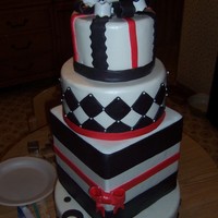 Black, White & Red Display Cake This is my first display cake... I made it for the hotel my mother-in-law works at. Unfortunately, she couldn't find cake dummies in...