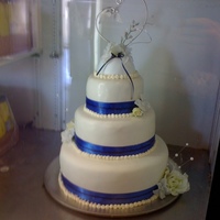 Simple Wedding Cake Only my second wedding cake ever made... simple ribbon and icing dots