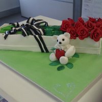 Twelve Red Roses This is a box of 12 long stemmed red gumpaste roses.Valentines day cake for my husband from me. Cherry ripe dark chocolate mud cake with...