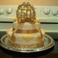 50Th Anniversary Ribbon and 50th sign are not edible, the rest is fondant