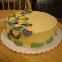Mother's Day Cake With Pansies Made for my mother-buttercream icing and leaves with royal icing pansies.