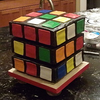 Rotating Rubik Cube Cake The Rotating Rubik Cube Cake I made for Cole's kindergarten "80's Celebration". Here's the link to see it rotating...