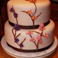 Autumn Baby Shower Cake a cake for a friends baby shower. first time I used the steamer and made tiny little flowers.