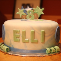 Girly Birthday Cake a cake for my 8 year old friend Elli, she is very into Peace signs and tie-dyed things.