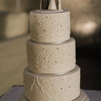 My White Lace Wedding Cake Three tier cake dummies covered in white fondant with hand piped royal icing lace.Figurines and background are gumpaste.. *please excuse...
