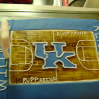 Uk Basketball Cake butter golden cake with buttercream icing and fondant with blue gel color, floor made with brown gel color and etched to make grooves in...