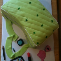 Purse Cake THIS CAKE WAS MADE FOR AN 11 YEAR OLD GIRL FOR HER BIRTHDAY, WHICH HAPPENS TO FALL ON ST PATRICKS DAY. PURSE IS COVERED IN MMF AND...