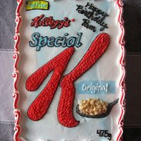 Special K This cake was a chocolate 1/4 slab covered in BC icing. The cereal on the spoon is actually Special K :) The Birthday girl is a Special K...