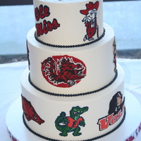 50Th Birthday Cake For An Ole Miss/sec Fan My customer wanted every SEC team mascot represented on her husband's birthday cake, with Ole Miss dominating on the top tier. I...