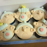 Baby Cupcakes With Beanies And Dummies vanilla cupcakes with white chocolate ganache