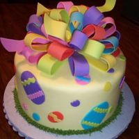 Easter Easter eggs and flowers from fondant. Gumpaste bow.