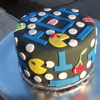 Mr And Mrs Pacman Cake This was birthday cake i made for a friends mom who LOVES Pacman. It's done on a 6" round with Cookies n Cream filling.
