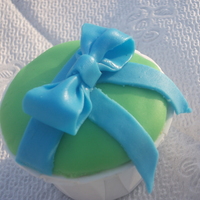 A Gift For You Cupcake First time trying a fondant bow! My lines could have been cleaner but i'm still learning!