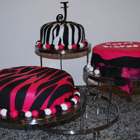 Daughter's Birthday Cakes Made these for my daughter's birthday. Pink zebra cake is strawberry cake with strawberry cream cheese icing. Other two cakes are...